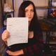 Holding a copy of the search warrant in her right hand, trans streamer Clara "Keffals" Sorrenti details the trauma Ontario police inflicted on her during a recent swatting incident.